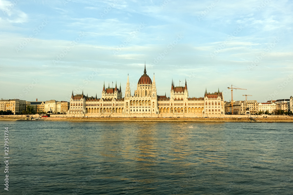 Hungarian Parliament Building in the evening at the Danube river in Budapest, Hungary