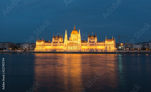 Hungarian Parliament Building in the evening at the Danube river in Budapest  Hungary