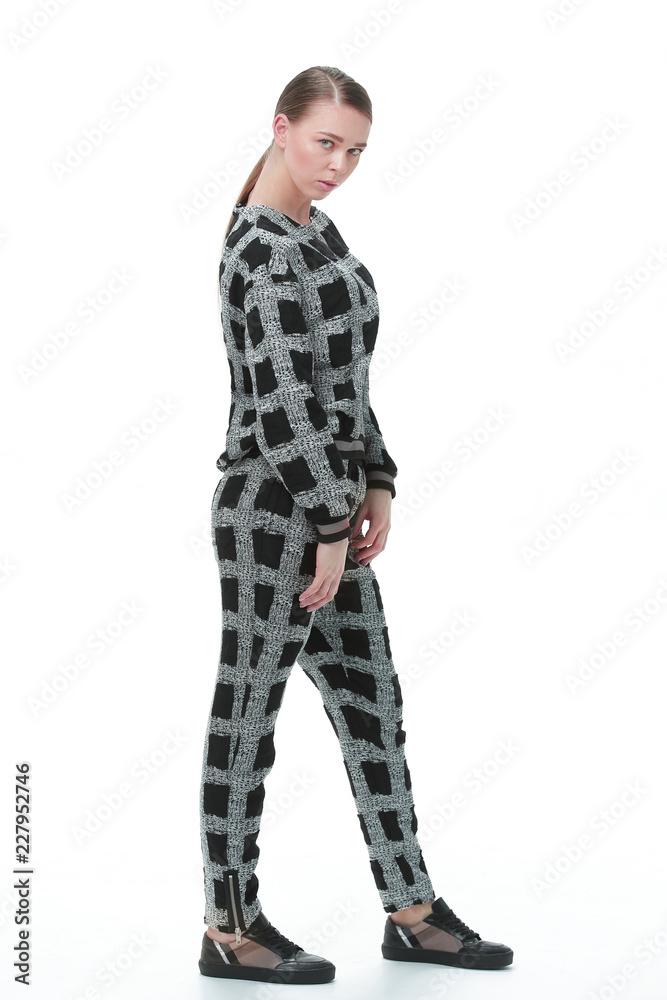side view.young woman in comfortable pajamas.isolated on white side view.young woman in comfortable pajamas.isolated on white