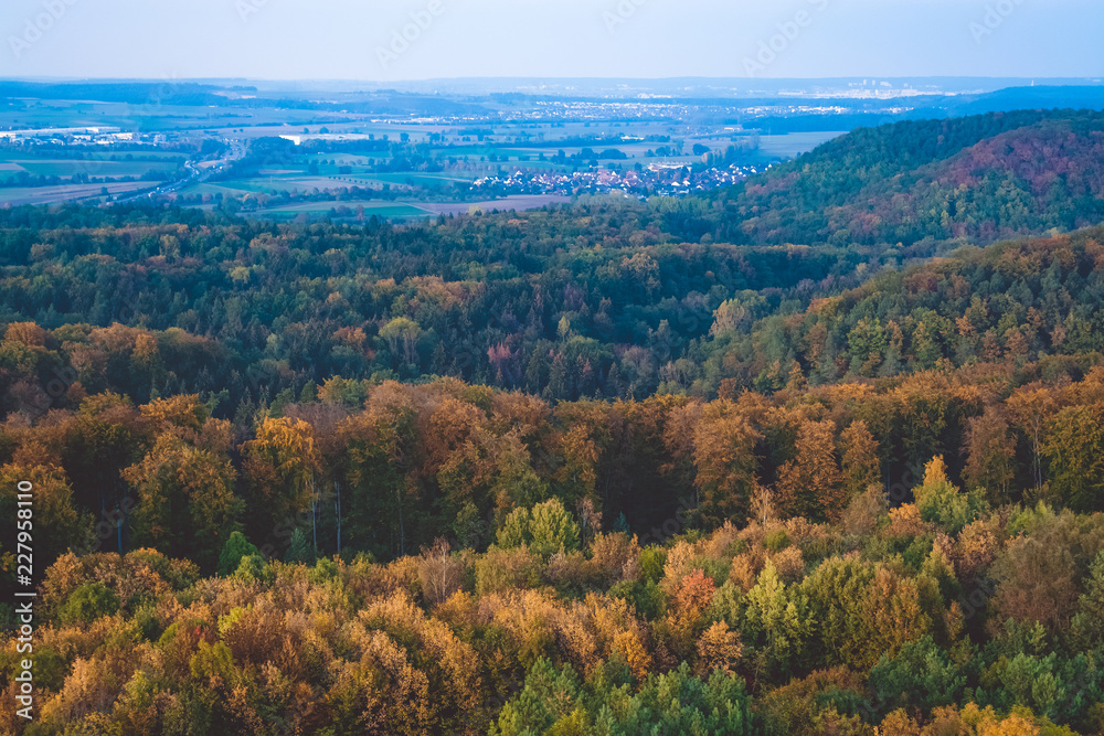  Beautiful view. View from the height. Germany. Autumn forest. Clear sky.