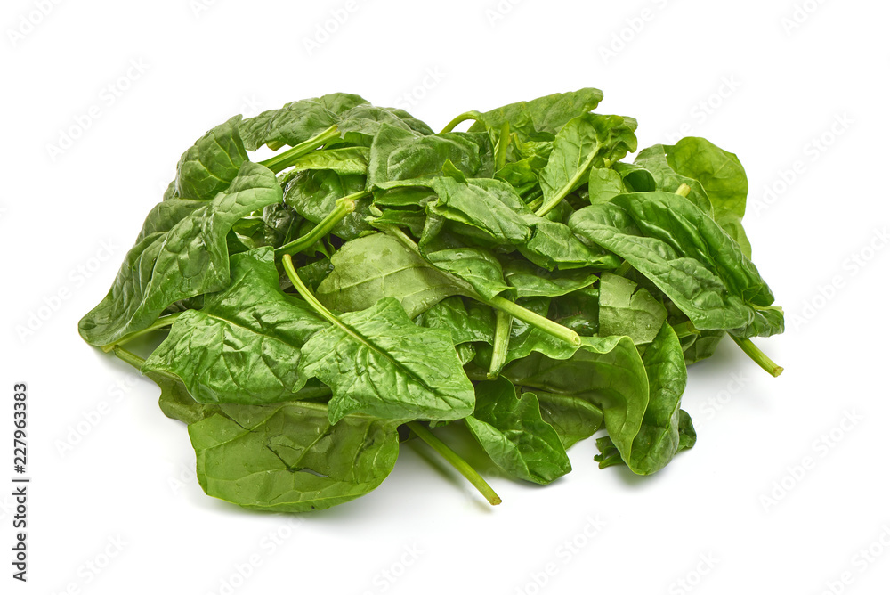 Green spinach leaves, isolated on a white background. Close-up Green spinach leaves, isolated on a white background. Close-up