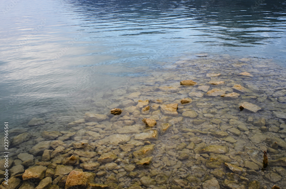 Blue water and rocks