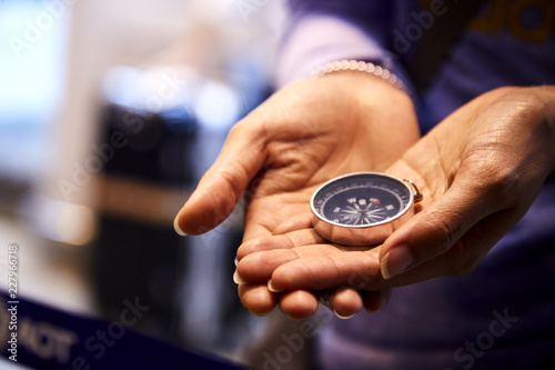 compass in a woman's hand