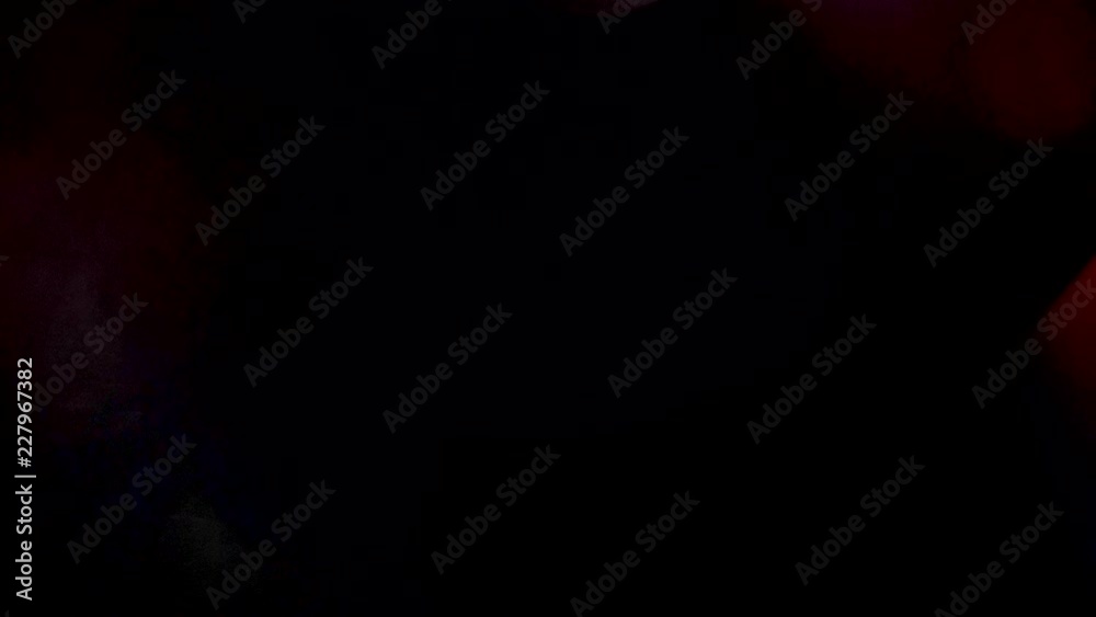 Colorful dynamic lens flares over a black background