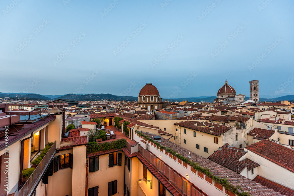 Obraz premium Firenze, Florence, Italy historic city with church duomo famous dome architecture, summer evening sunset night cityscape skyline, mountain aerial view of urban rooftops