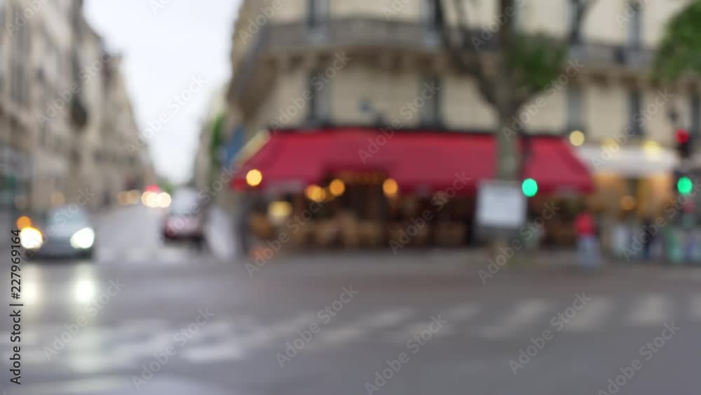 Blurry view of car traffic driving through street intersection in Europe Blurry view of car traffic driving through street intersection in Europe