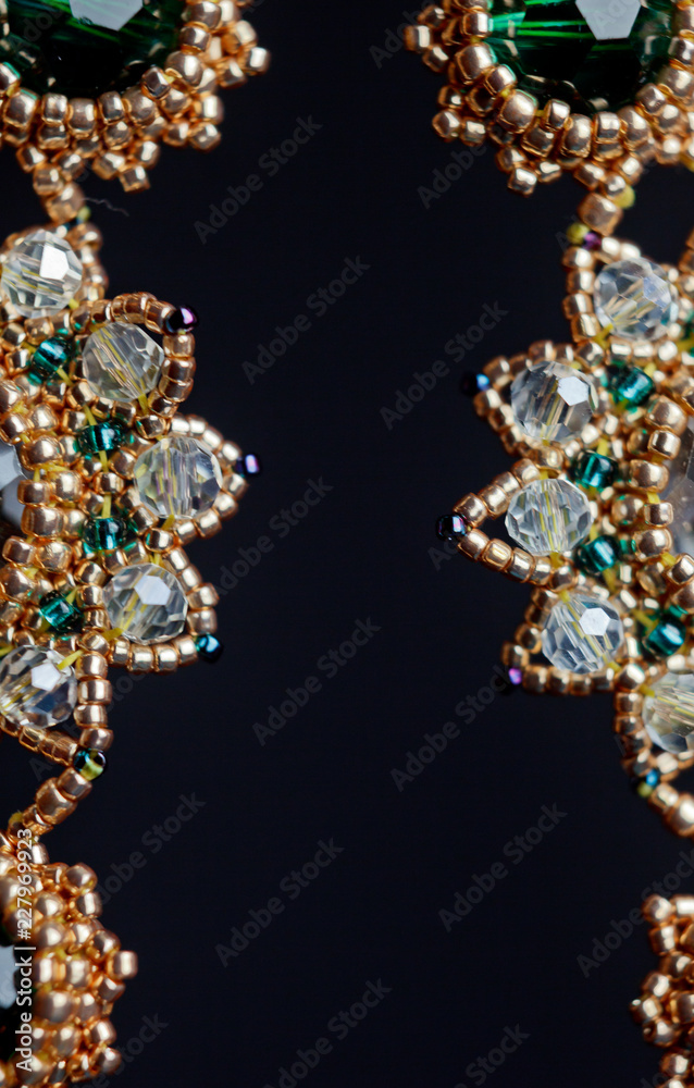 handmade jewelry made of beads in macro. earrings from white beads. earrings from stones handmade jewelry made of beads in macro. earrings from white beads. earrings from stones