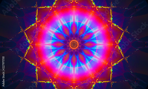 Bright blue, red, and gold star-shaped mandala Art with a beautiful light pattern.