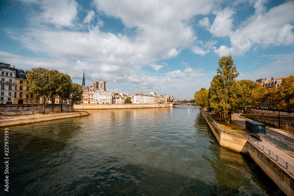 Landscape view on the river with Notres-Dame cathedral in Paris, France