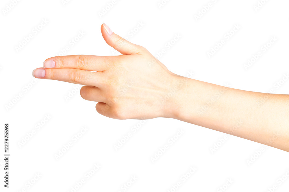 Woman hand pointing to the left with two fingers Woman hand pointing to the left with two fingers