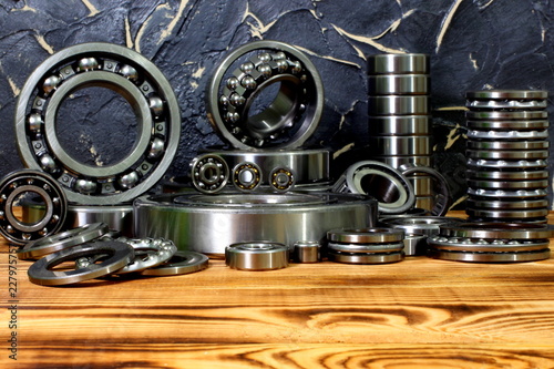 Various bearings are laid out on the tabl
