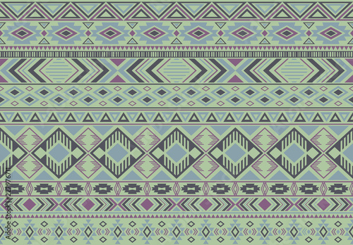 Ikat pattern tribal ethnic motifs geometric seamless vector background. Chic ikat tribal motifs clothing fabric textile print traditional design with triangle and rhombus shapes.