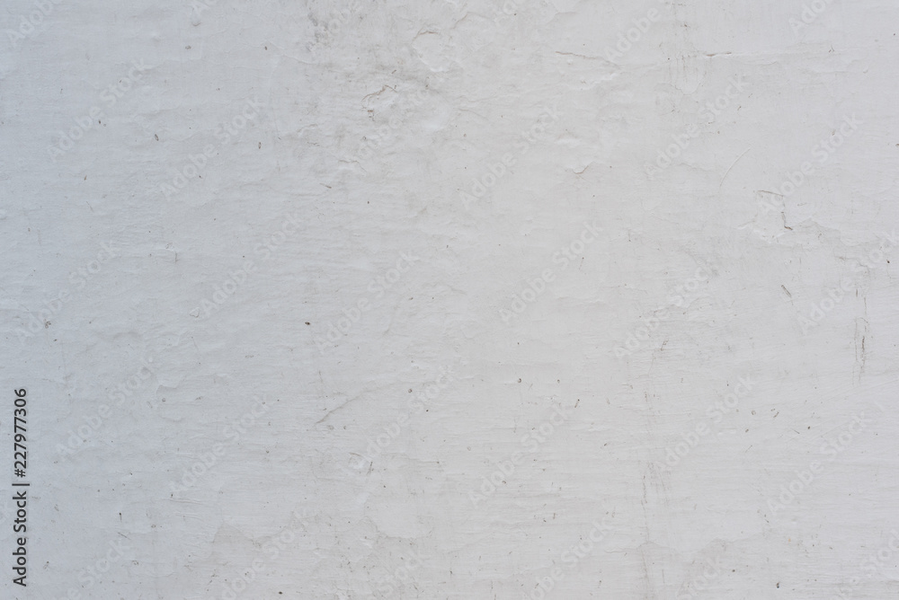 Wall fragment with scratches and cracks. It can be used as a background Wall fragment with scratches and cracks. It can be used as a background