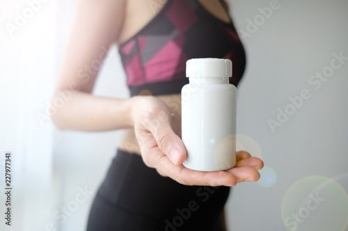 woman workout vitamin supplement.slim weight lost