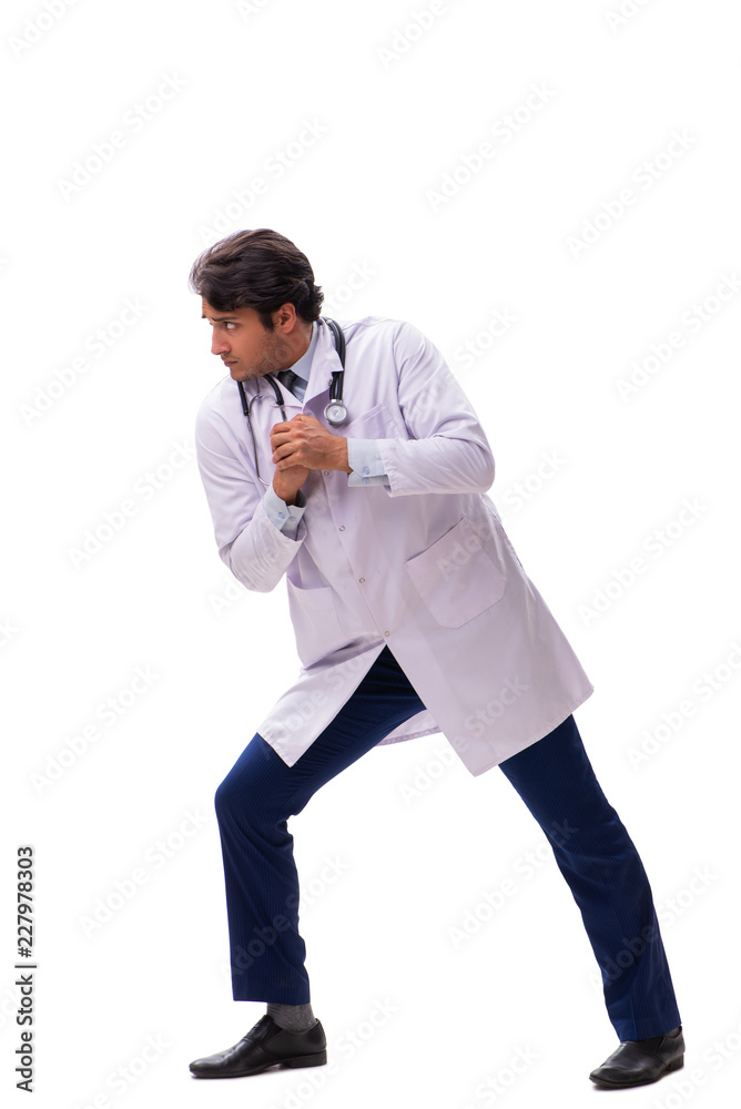 Young handsome doctor under pressure isolated on white Young handsome doctor under pressure isolated on white