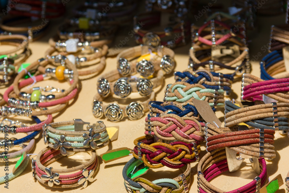 Handmade leather bracelets. Street market souvenirs, wristbands, costume jewelry concepts