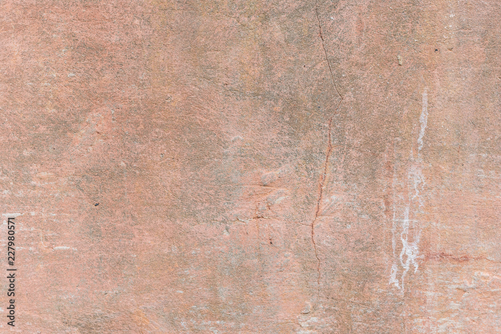 Wall fragment with scratches and cracks. It can be used as a background Wall fragment with scratches and cracks. It can be used as a background