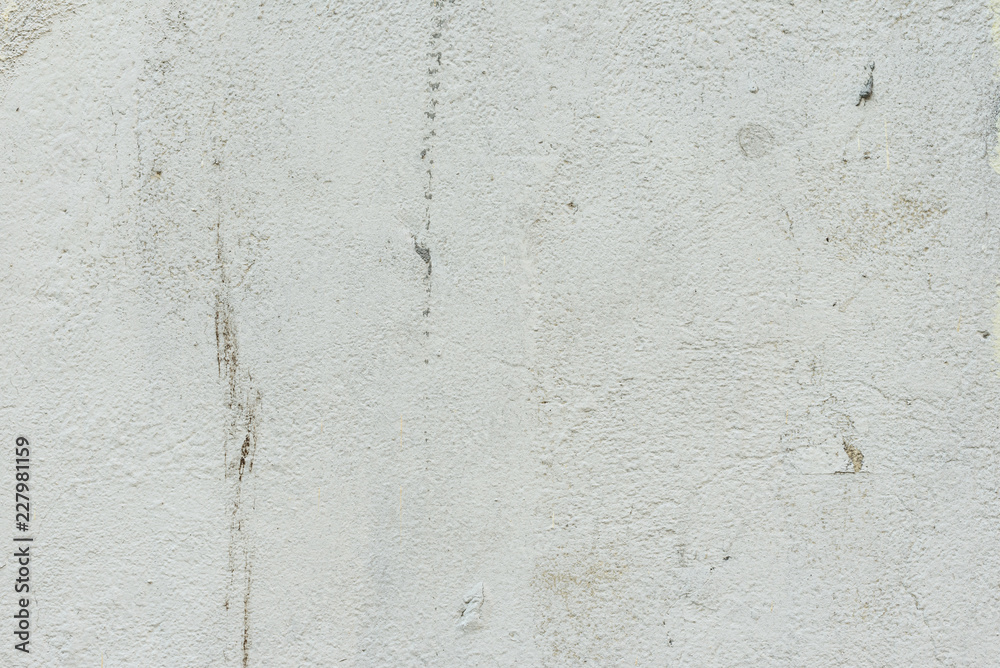Wall fragment with scratches and cracks. It can be used as a background Wall fragment with scratches and cracks. It can be used as a background