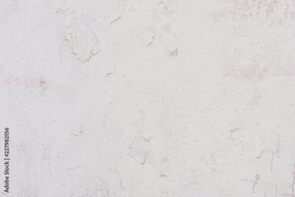Wall fragment with scratches and cracks. It can be used as a background Wall fragment with scratches and cracks. It can be used as a background