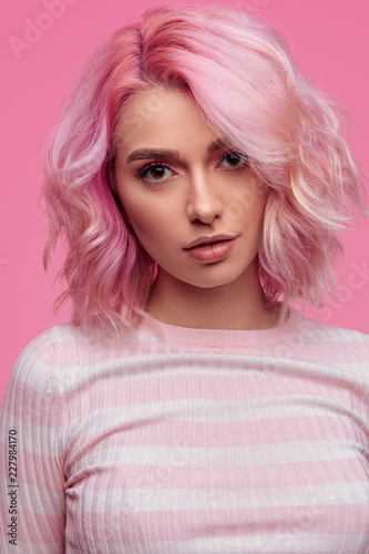 Attractive woman with pink hair