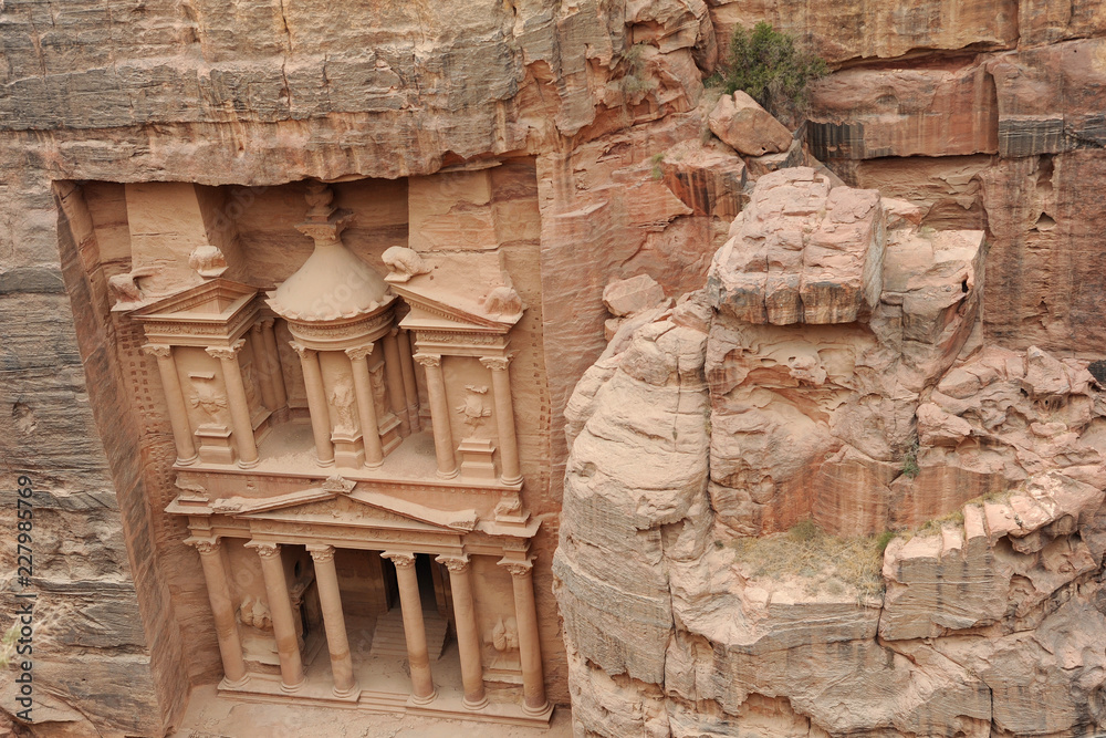 Al-Khazneh  called The Treasury is one of the most elaborate temples in the ancient Arab Nabatean Kingdom city of Petra. This structure was carved out of a sandstone rock face.
