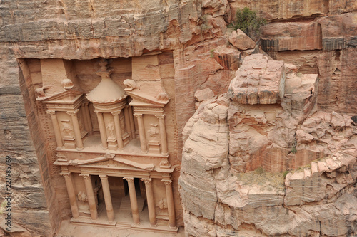 Al-Khazneh called The Treasury is one of the most elaborate temples in the ancient Arab Nabatean Kingdom city of Petra. This structure was carved out of a sandstone rock face.
