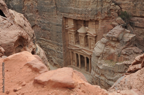 Al-Khazneh called The Treasury is one of the most elaborate temples in the ancient Arab Nabatean Kingdom city of Petra. This structure was carved out of a sandstone rock face.