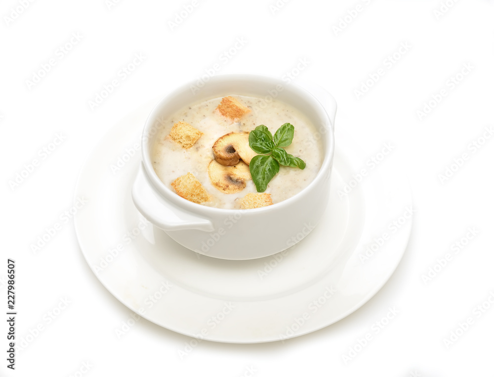 champignon soup with croutons on white background champignon soup with croutons on white background