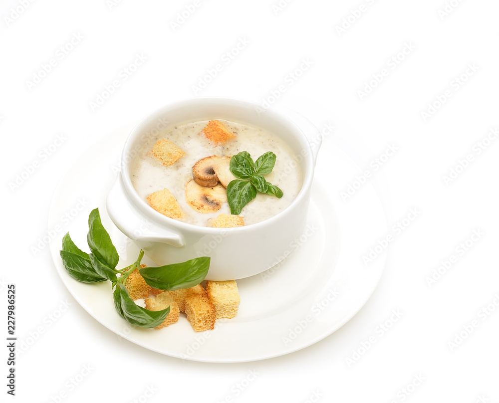 champignon soup with croutons on white background champignon soup with croutons on white background