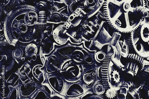 Steampunk background, machine parts, large gears and chains from machines and tractors. © AKlion