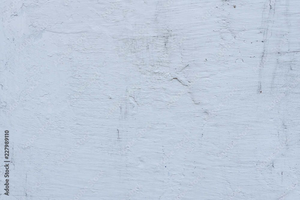Wall fragment with scratches and cracks. It can be used as a background Wall fragment with scratches and cracks. It can be used as a background