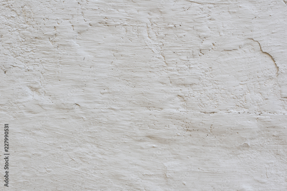 Wall fragment with scratches and cracks. It can be used as a background Wall fragment with scratches and cracks. It can be used as a background