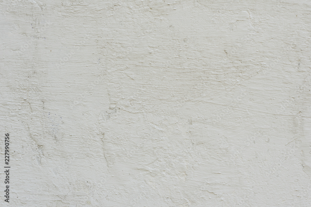 Wall fragment with scratches and cracks. It can be used as a background Wall fragment with scratches and cracks. It can be used as a background