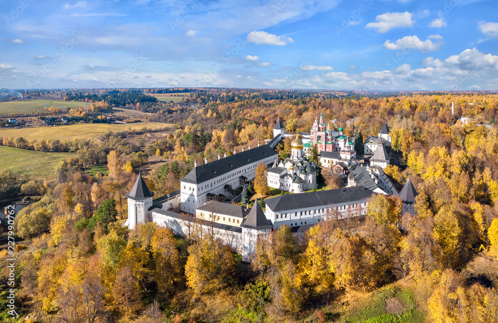 Autumn yellow forest surrounding Savvino-Storozhevsky Monastery in Zvenigorod, Moscow oblast, Russia