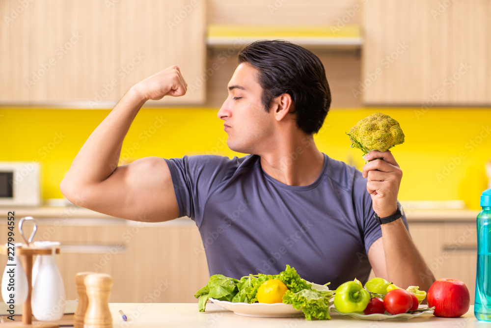 Young man in dieting and healthy eating concept Young man in dieting and healthy eating concept