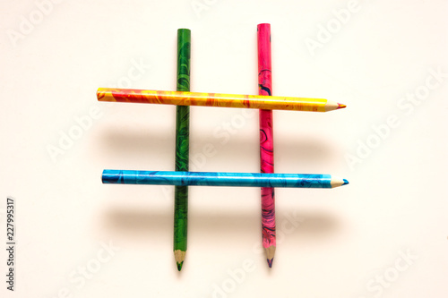 pencils are in the form of a hashtag. Multi-colored hashtag. Beautiful design