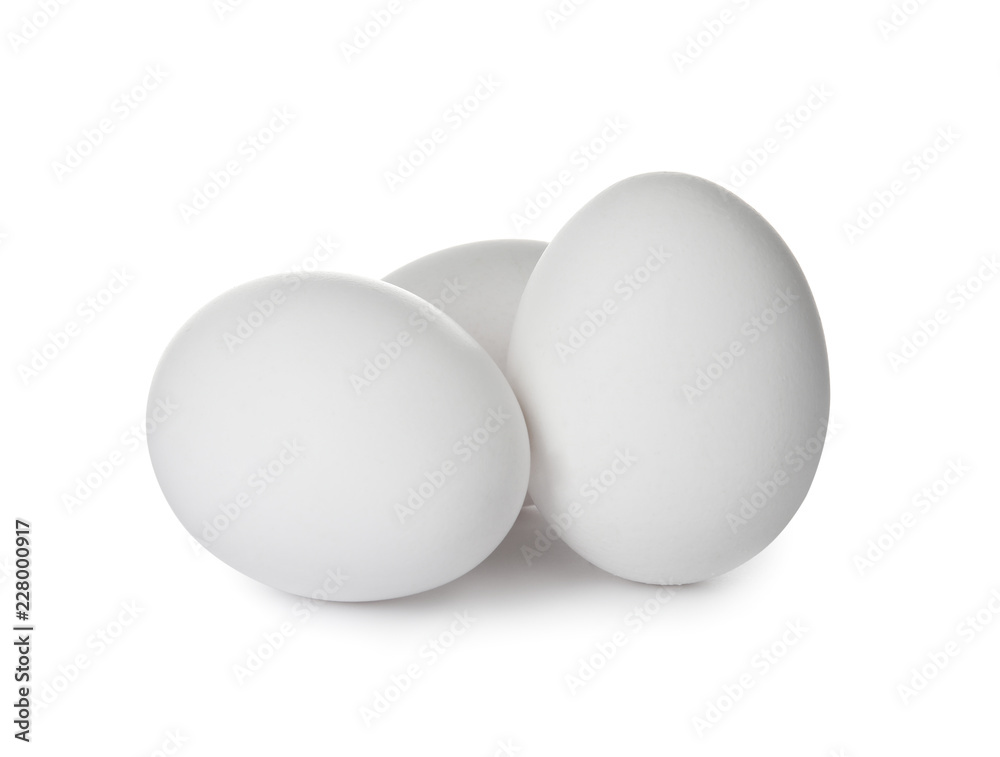 Few raw chicken eggs on white background Few raw chicken eggs on white background