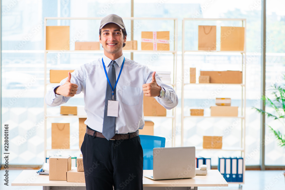 Male employee working in box delivery relocation service Male employee working in box delivery relocation service