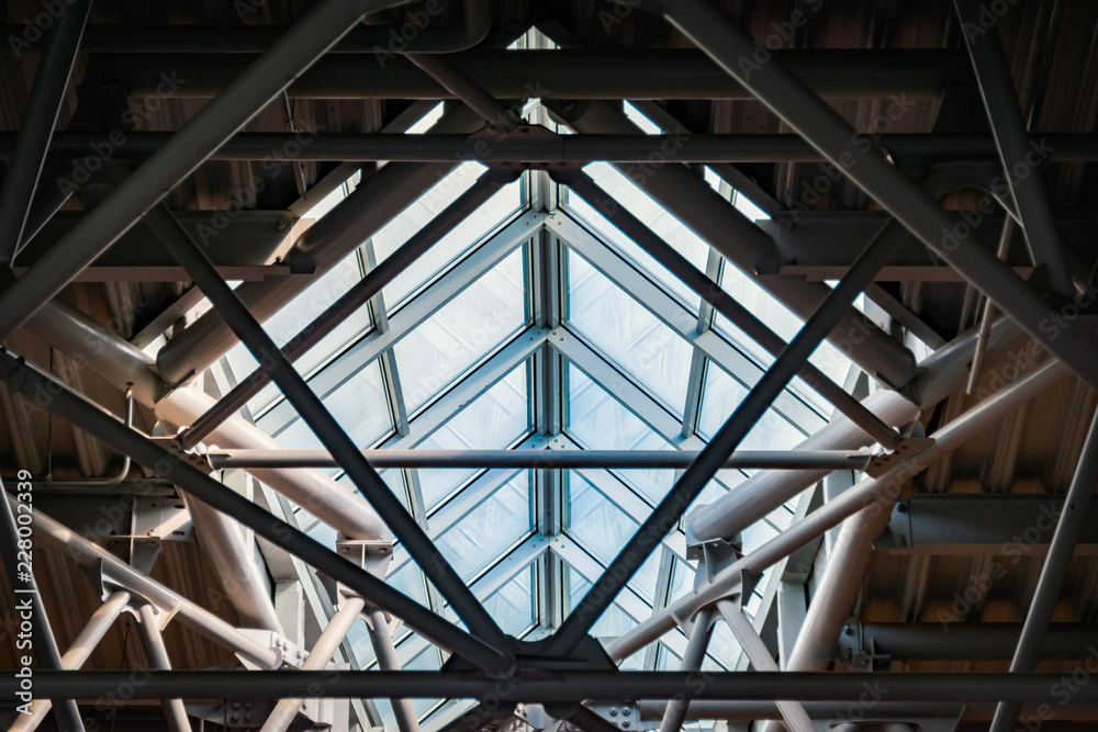 Metal beams and modern glass ceiling at airport. Metal beams and modern glass ceiling at airport.