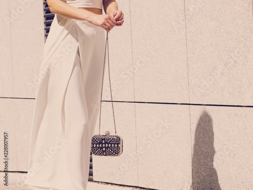 Woman wearing purse and culottes