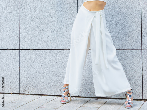Woman wearing high heels and culottes