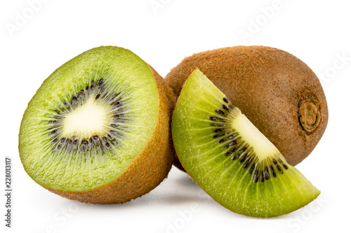 Ripe kiwi with a half and a piece of close-up on a white. Isolated.