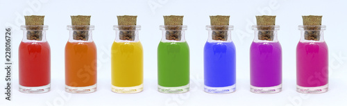 Glass bottles with colored liquids