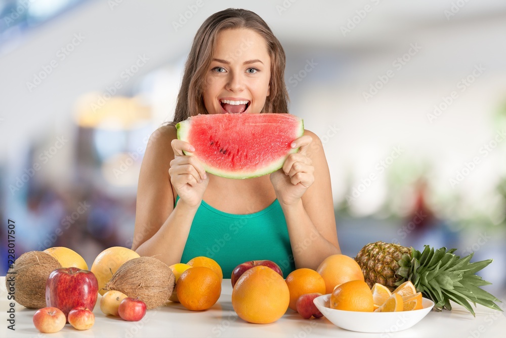 Portrait of young cute woman eating watermelon Portrait of young cute woman eating watermelon
