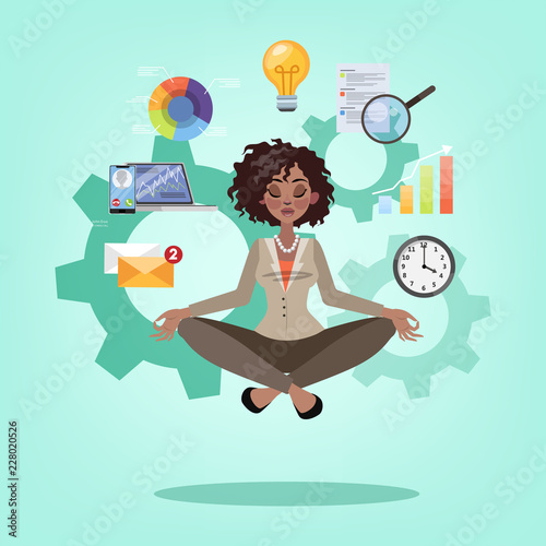Business woman in lotus pose having break at work