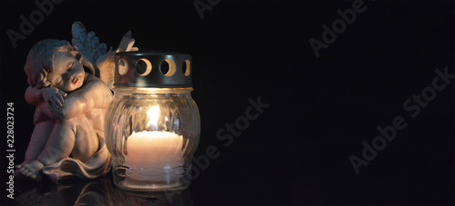  Angel and burning candle photo