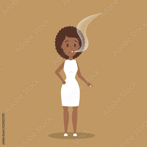 African american woman holding cigarette and smoking