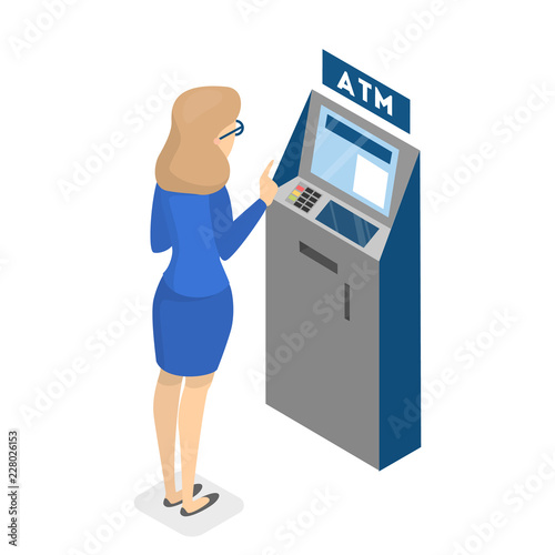 Woman using ATM machine and gets money