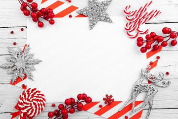 Red christmas frame with stars, snowflakes and candies