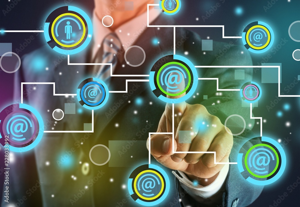 Man touching business elements on screen Man touching business elements on screen